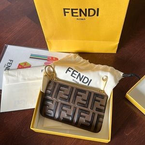 Fendi pink keychain wallet pouch.